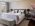 Leistung Hotelfotografie: Schlafzimmer der großen Suite im Maison Messmer Hotel in Baden-Baden - Luxus und Komfort in perfekter Harmonie.